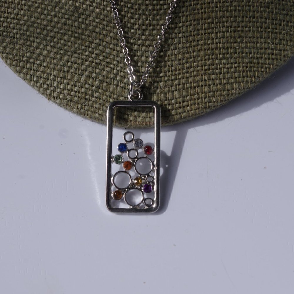 Women`s silver tone colorful crystal necklace.